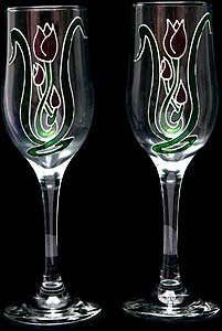 Pair of Champagne Flutes in a Mackintosh Tulip Design. Handpainted and designed in the UK by Beverley Gallagher, these significant and expressive gifts are ideal for birthdays, anniversaries, weddings, engagements, Christmas, Valentine's Day, Mother's Day, Easter and special celebrations.