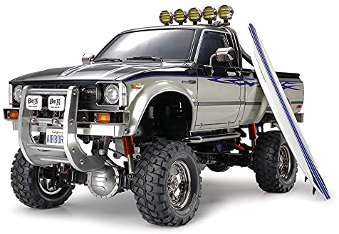 TAMIYA TMYTAM58397 1:10 RC Toyota HiLux HighLift 4x4 3-Gang - ferngesteuertes Auto - inkl. Surfbrett - Offroad - Pick Up -Elektromotor - Modellbausatz - Metallgetriebe - unlackiert - 58397, Schwarz
