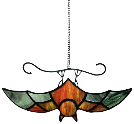 stehen kopfüber fledermaus buntglas