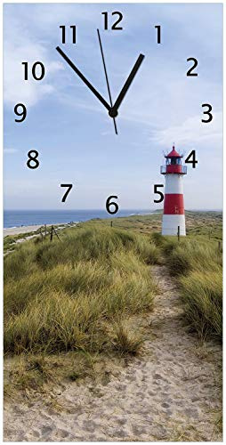 Wallario Design-Wanduhr, Acrylglasuhr Größe 30 x 60 cm, Schwarze Zeiger, Motiv Am Strand von Sylt Leuchtturm auf der Düne Panorama