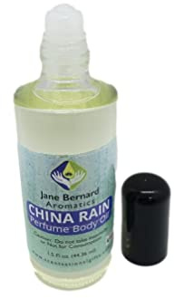 Jane Bernard CHINA RAIN | Genderless (Unisex), Long Lasting Fragrance Perfume Body Oil_44 ml_1.5 Oz Roll | Green Notes, Notes of Roses, White Lilies and Musk plus 15 ml matching Shea Lotion