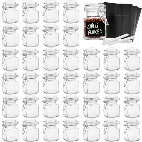 Oak & Steel - 24 Mini Clip Top Glass Spice Storage Jars - 100 ml Glass Canister Containers with Lids, 48 Labels and 2 Chalk Pen (8 x 5cm) - Perfect for Spice Storage, Jam, Honey, Gifting (24)