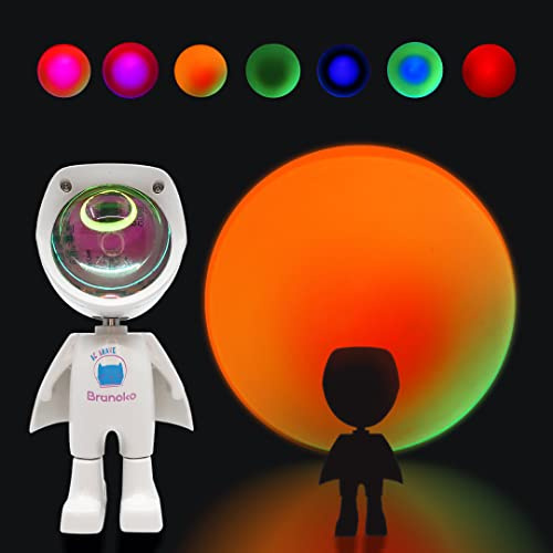 BRUNOKO Luz nocturna infantil - Lámpara de proyector sunset con forma de astronauta 7 colores - Proyector de luz nocturna infantil ajustable en 360° - Luz quitamiedos para niños en 7 colores