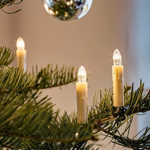 hellum Lichterkette innen Wachstropfen ivory, 20 Kerzen, Stecker teilbar | Made in Germany warmweiß, Lichterkette Tannenbaum mit Clip, 13,30m beleuchtet, Kabel grün, inkl. 3 Ersatzkerzen <59lm 430141