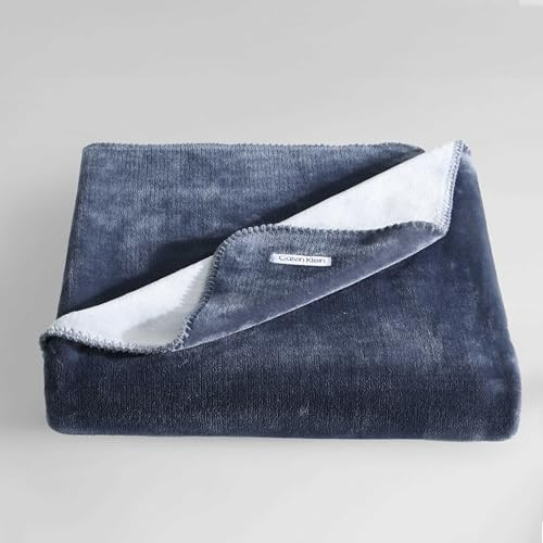 Calvin Klein - Throw Blanket, Reversible Premium Plush Bedding with Whipstitch Detailing, Practical Luxury Bedding Essentials, Ideal Valentine's Day Gifts (Modern Reversible Solid Blue, 50 x 70)