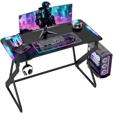 BEXEVUE Escritorio Gaming 100x52 cm con LED RGB Armor, Mesa de Ordenador con Fibra de Carbono y Marco Z, Escritorio PC con Gancho Auriculares, Montaje Fácil, Negro