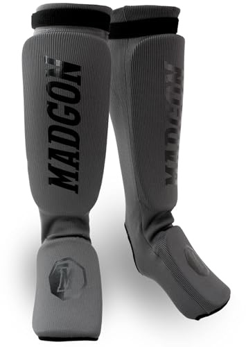 MADGON Espinilleras Kick Boxing Ajuste y Acolchado Ideal – Protección de Espinillas Baja Transpiración – Espinilleras Muay Thai – Protectores de Piernas para Artes Marciales – Incluye Funda