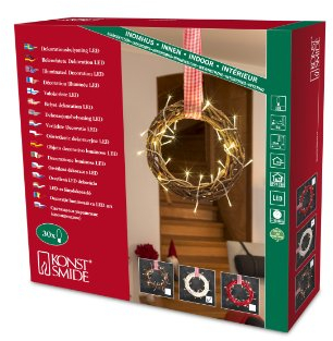 Konstsmide LED Holzsilhouette Kranz, weiß, mit rot-weißem Stoffband, 30 warm weiße Dioden, 24V Innentrafo, transparentes Kabel - 6218-200
