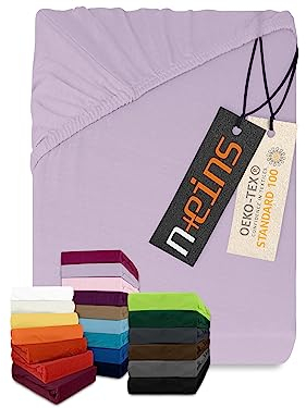 npluseins Sábana bajera clásica con esquinas elásticas en jersey, disponible en 34 colores modernos y 6 tamaños diferentes, 100% algodón, 90-100 x 200 cm, lila