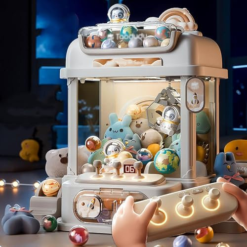 CUCUKAKA Candy Grabber avec Télécommande ， Machine a Bonbon avec Pince avec 8 Planètes,2 Poupées Panda,25 Poupées,20 Gashapons pour Les Cadeaux De Noël,White