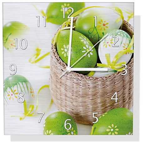 Wallario Design Wanduhr Ostergruß - Bunte bemalte Ostereier in einem kleinen Körbchen aus Aluverbund, Alu-Uhr Größe 30 x 30 cm, weiße Zeiger mit Metalloptik