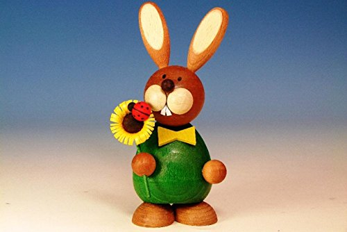Osterdeko Osterhasenfigur Hase stehend mit Sonnenblume Figur aus Holz, handgemacht, Volkskunst aus dem Erzgebirge als Dekoration für Ostern, 12 cm