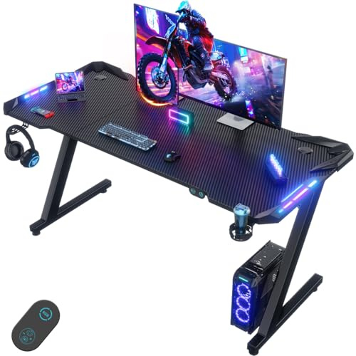 Devoko Escritorio Gaming con Luces LED, 140 x 60cm RGB Mesa Gaming Forma Z, Escritorio de Ordenador Grande con Gancho para Auriculares y Portavasos, Mesa Gamer para Oficina en Casa, Negro