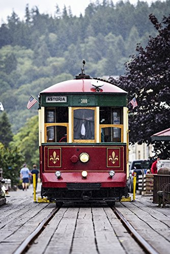 The Astoria Trolley running along the riverfront Astoria Oregon United States of America Poster Print by Robert L Potts Design Pics (11 x 17)