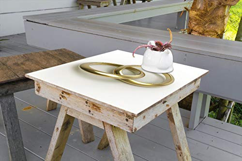 Wallario Selbstklebende Möbelfolie/Tischdecke für Innen und Außen, Größe: 50 x 50 cm - Zwei goldene Eheringe in Nahaufnahme auf weißem Grund