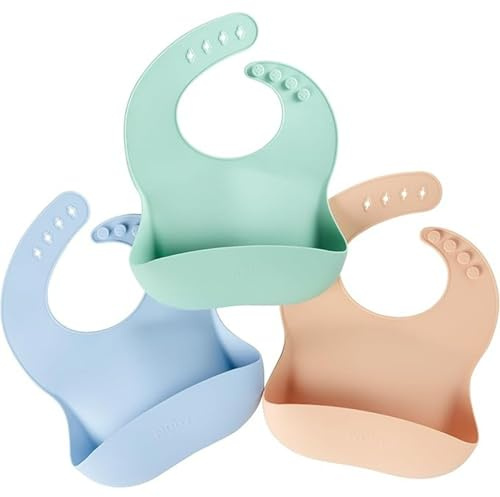 Nuby Confezione da 3 Bavaglini in Silicone per Bambino – Impermeabili e Facili da Pulire – Morbidi e Flessibili – Cinghie Regolabili – Tasca Raccogli-Cibo Integrata – Bavaglini per Neonato e Bambino