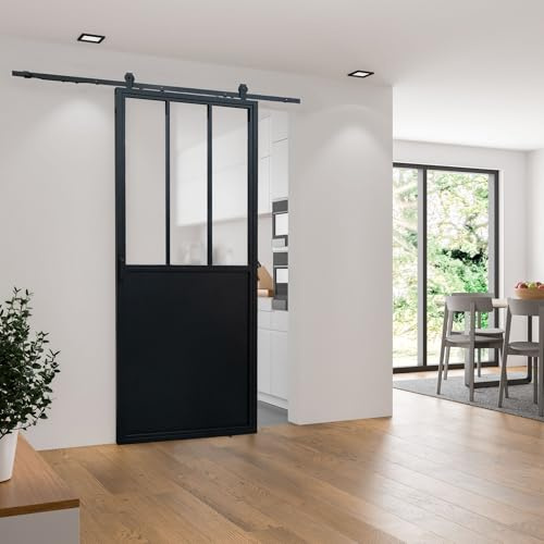 Loftschiebetür aus Stahl in schwarz mit Glaseinsatz satiniert