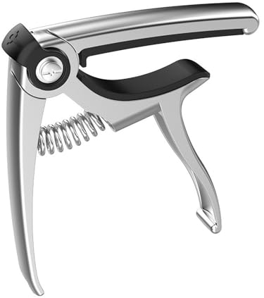 Olycism Kapodaster für Gitarre eingebautem Gitarre Plektren Halter, Gitarrenbrücken, Saitenschneider für Gitarre, Akustik E-Gitarre, Ukulele, Banjo Silber