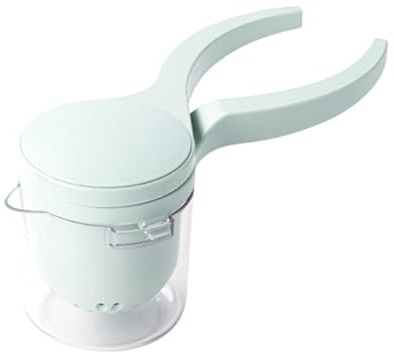 Presse-agrumes à main - Outil de cuisine idéal pour la cuisine et le rangement - Manuel et citron - Dimensions : 7 x 9 cm - Fabriqué en silicone - Vert