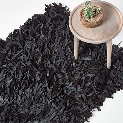 Homescapes Lederteppich Dallas 150 x 240 cm, Fransenteppich aus 100% Echtleder, moderner Shaggy-/Hochflor-Teppich, schwarz