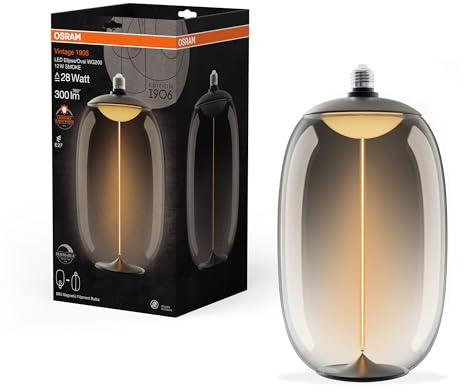 Osram Vintage 1906 Big Elipse Oval ist eine dimmbare LED-Lampe aus Kunststoff mit Filament in Ellipsenform. Sie bietet 12 W für 300 lm, E27 Fassung, Smoke Design, 200 mm Durchmesser, CRI 80, 1800 K.