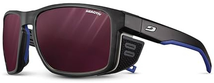 Julbo Shield Mountain Lunettes de soleil – Monture translucide noir/bleu/blanc – Verres roses (REACTIV 0-4 Contraste élevé)