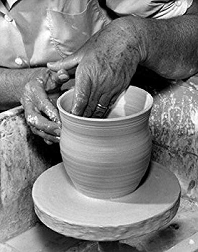 Potter working on a pottery wheel Poster Print (24 x 36)