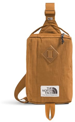 The North Face Berkeley Field Bag | Water Repellent Finish, Vintage Style Travel Essential, Sling Holds Water Bottles, Phones & Keys, Timber Tan/TNF Black, One Size