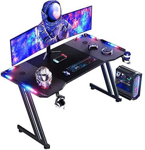 HLONONE 140 x 60 cm Gaming Schreibtisch, Gaming Tisch mit LED, PC Tisch Gaming mit Kohlefaseroberfläche, Stabiler Computertisch für Gaming mit Kopfhörerhaken und Getränkehalter, Schwarz