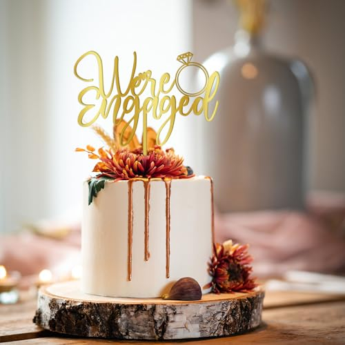 AROKIPPRY We're Engaged Cake Topper for Engagement Party Decorations, Engaged Ring Sign,We're Engaged Cake Toppers,Bridal Shower - Wedding Engagement Theme Party Decorations Gold flash (acrylic)