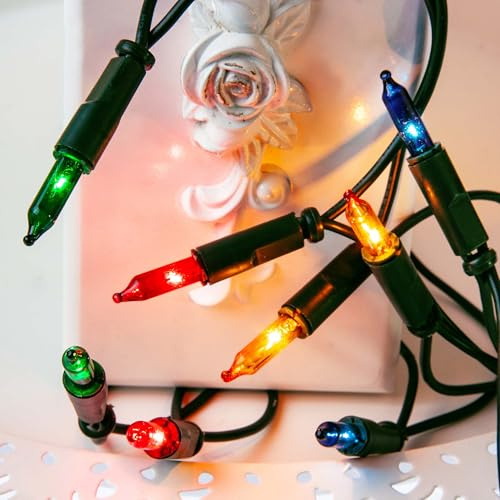 Hellum Guirlande lumineuse pour intérieur, alimentée en 230 V, avec prise, 10 lumières colorées, longueur éclairée 1,35 m, câble vert, salon, véranda, décoration de Noël, <59 lumens, 831177