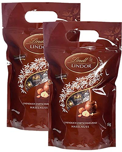 Lindt LINDOR Schokoladen Kugeln Haselnuss | 1 kg Beutel, wiederverschließbar | ca. 80 Schokoladen Kugeln Haselnuss-Milch-Schokolade | Großpackung, Pralinen-Geschenk, Schokoladengeschenk (2 x 1 kg)