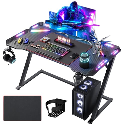 Claiks LED Gaming Desk with RGB Lights, 120 x 60cm Carbon Fibre Gamer Desk for Home Office, Gaming Table with Mouse Pad, Cup Holder, Headphone Hook & Cable Management