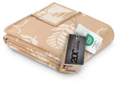 Ibena 1946 Exklusive Jubiläumsdecke 140x200 cm - Bio Wolldecke, warm & weich - Made in Germany, 100% Baumwolle - Kuscheldecke beige mit Blattmotiv