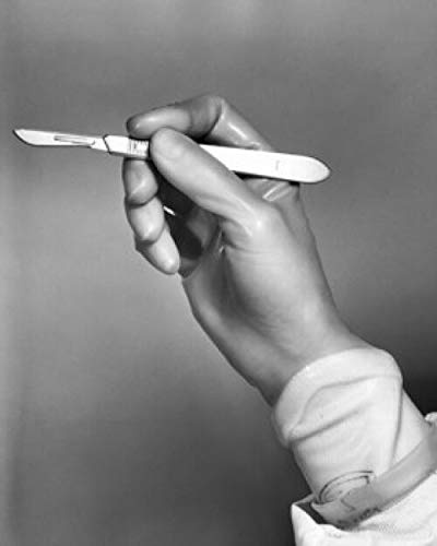 Posterazzi Surgeon's hand holding a scalpel Poster Print, (24 x 36)