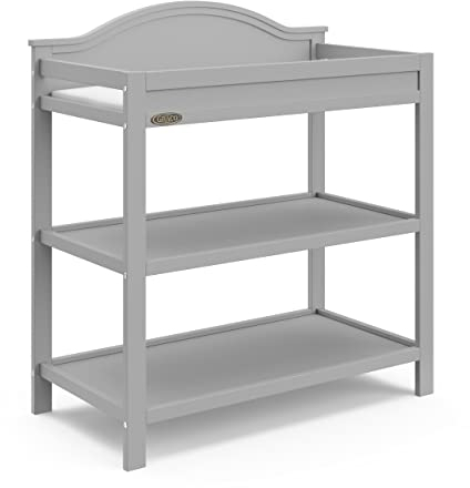 Graco Story Changing Table with Water-Resistant Pad – GREENGUARD Gold Certified Baby Changing Station with Safety Strap, 2 Open Shelves, and a Nursery Must-Have Design (Pebble Gray)