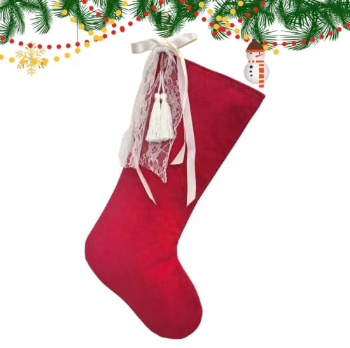 Traditionell julstrumpa Dekoration Av Röda Julsockor Med Vit Rosett
