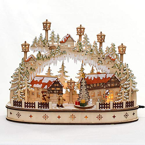 Dekohelden24 ***LED Holz Schwibbogen mit bewegtem Weihnachtsbaum, Motiv: Schneemann und Wanderfiguren, L/B/H ca. 45 x 12 x 35 cm, für Batterie- oder Adapterbetrieb.