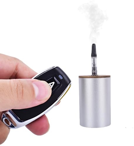 Yiduomile Mini máquina de humo para escenas fotográficas, dispositivo portátil de efecto niebla de metal con control remoto, perfecto para magia, cosplay y efectos especiales (metal blanco)