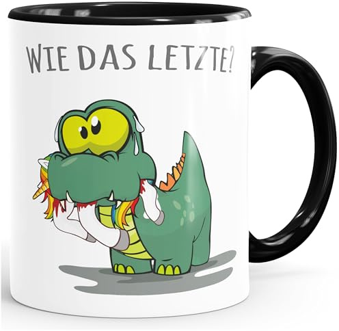 MoonWorks® Kaffee-Tasse Fun Motiv kleiner Dino frisst Einhorn Spruch Wie das Letzte? Bürotasse lustige Kaffeebecher Schwarz Keramik-Tasse