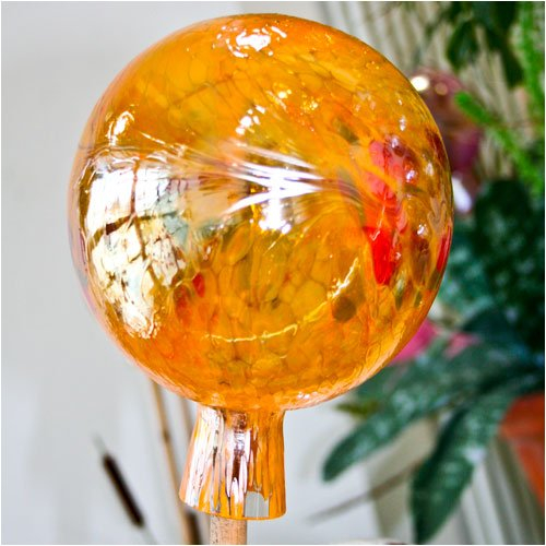Sfera da giardino da vetro arancione
