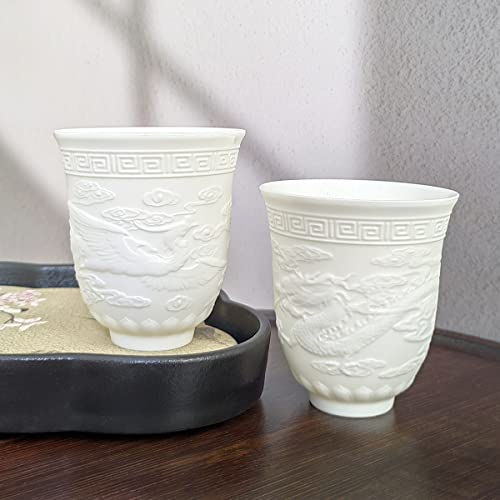 NIUKOMY Set di 2 Tazze da Tè Cinese in Ceramica, Kung Fu Tazza da Tè Porcellana, Giapponese Taza da Senza Manico Rilievo in Drago e Fenice Design, Bianche, 140ML