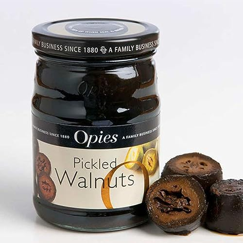 Opies Pickled Walnuts 390 g Harvested Before Shell Formulation, Cooked & marinated in a Special Malt Vinegar. Serve with Cheese, Cold Meats or as an Ingredient in casseroles & Salads.