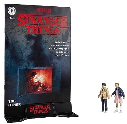 McFarlane Toys - Stranger Things Page Punchers, 2 Unidades, Figuras de acción de Eleven y Mike Wheeler de 3 Pulgadas con cómic