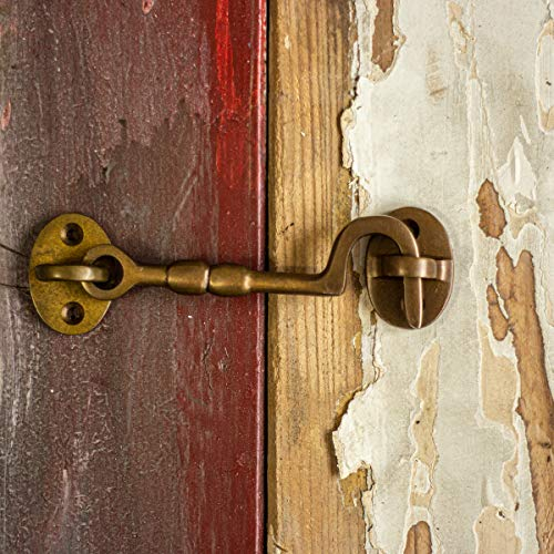 Antikas - Crochet tempête en laiton patiné – 10 cm.