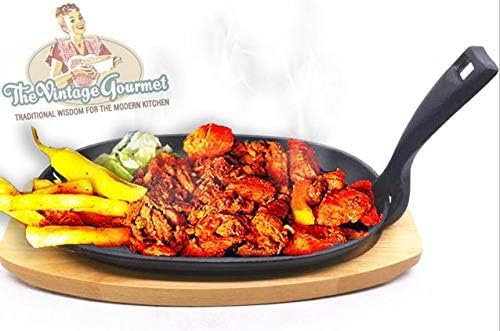 Vintage Gourmet ® Premium Pre-Seasoned Cast Iron Sizzler Serving Dish/Steak Platter with Wooden Stand, Black, 28cm x 14 cm Create that Authentic Feel, Serve Your Dishes Sizzling at the Table!