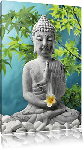 Pixxprint Buddha auf Steinen mit Monoi Blüte in der Hand, Größe: 100x70cm, Leinwandbild, fertig gespannt, Wandbild, Dekoration, Kunstdruck, kein Poster