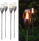 Navaris 4x Antorcha solar LED de exterior - Luces de jardín con efecto de llama - Lámparas decorativas con estaca para césped - Acero inoxidable