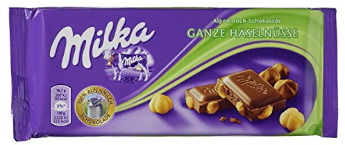 Milka Alpenmilch Schokolade Ganze Haselnüsse, 100 g