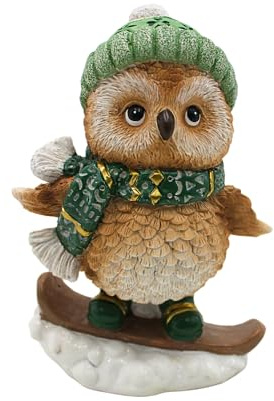 Dekohelden24 Wintereule, Weihnachtsfigur, Figur Eule, Deko-Kauz, Winterfigur mit Schal und Snowboard aus Keramik, in grün und braun, L/B/H 9 x 7 x 15cm.